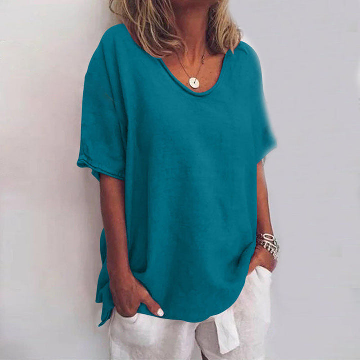 QUINA EN VEELZIJDIGE LINNEN BLOUSE